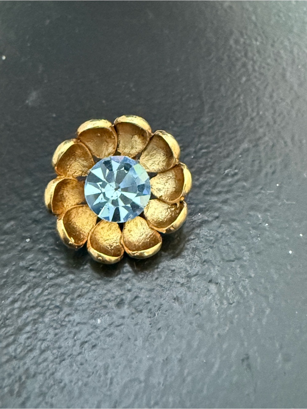 Oscar de la Renta's skillfully crafted Flower Ring adds a refined opulence to fe
